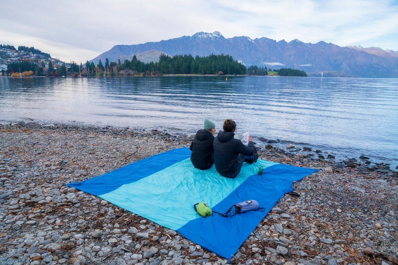 Beach Blanket Sandproof, Extra Large Beach Mat, Big & Compact Sand Free Mat Quick Drying, Lightweight & Durable with 6 Stakes & 4 Corner Pockets