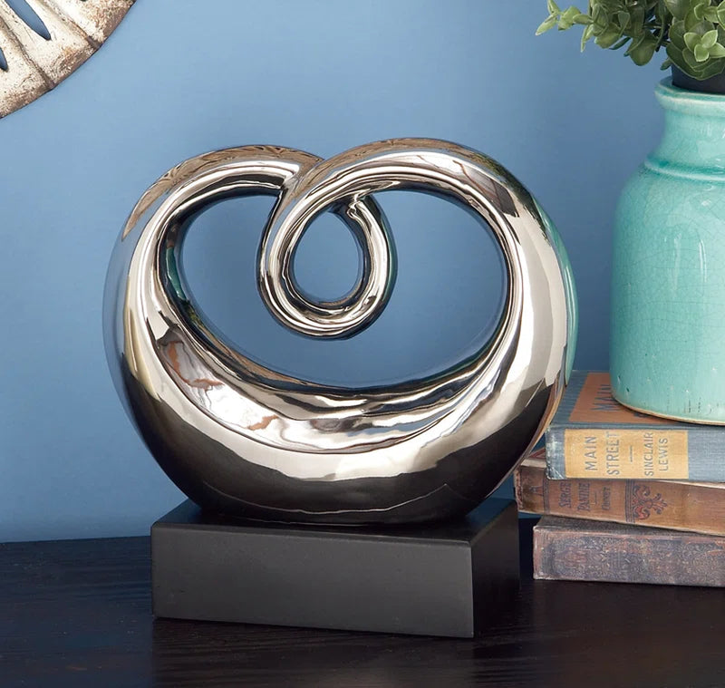 Allye Ceramic Swirl Abstract Decorative Silver Sculpture with Black Base